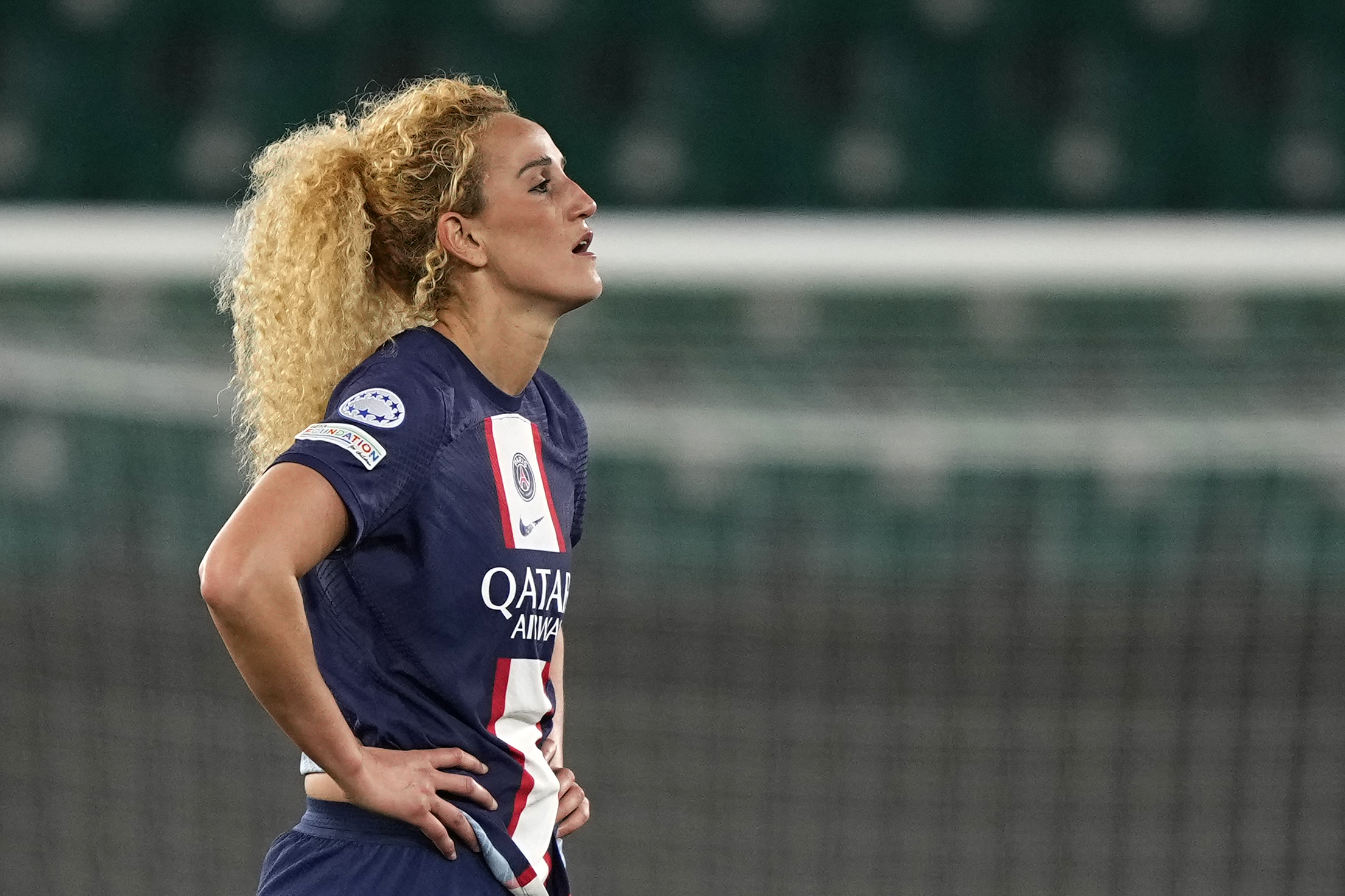 FILE - Then-PSG's Kheira Hamraoui stands on the field after the women's Champions League soccer quarterfinal second leg soccer match between VfL Wolfsburg and Paris Saint-Germain in Wolfsburg, Germany, March 30, 2023.