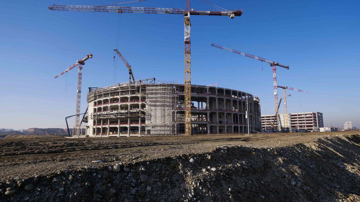 FILE - The Milano Santagiulia Ice Hockey Arena for the Milan Cortina 2026 Winter Olympics is seen under construction in Assago, Italy, Jan. 15, 2025.