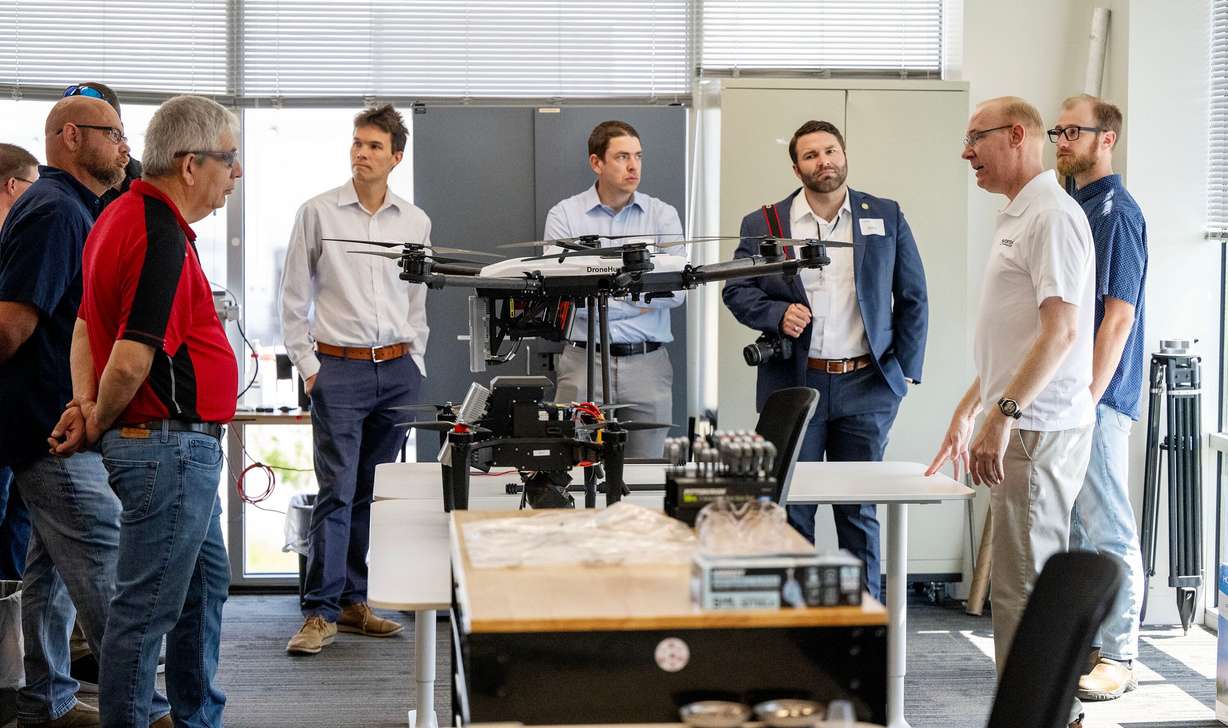 Visitors are given a tour at Fortem Technologies' opening of its advanced manufacturing headquarters in Lindon on Tuesday. Chief Technology Officer Adam Robertson said the company is here to "protect America" and "our freedom."