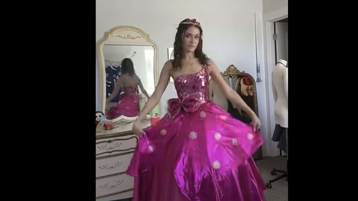 Social media influencer Alexandra Louise showcases her new dress based on the movie "Barbie: Princess Charm School."
