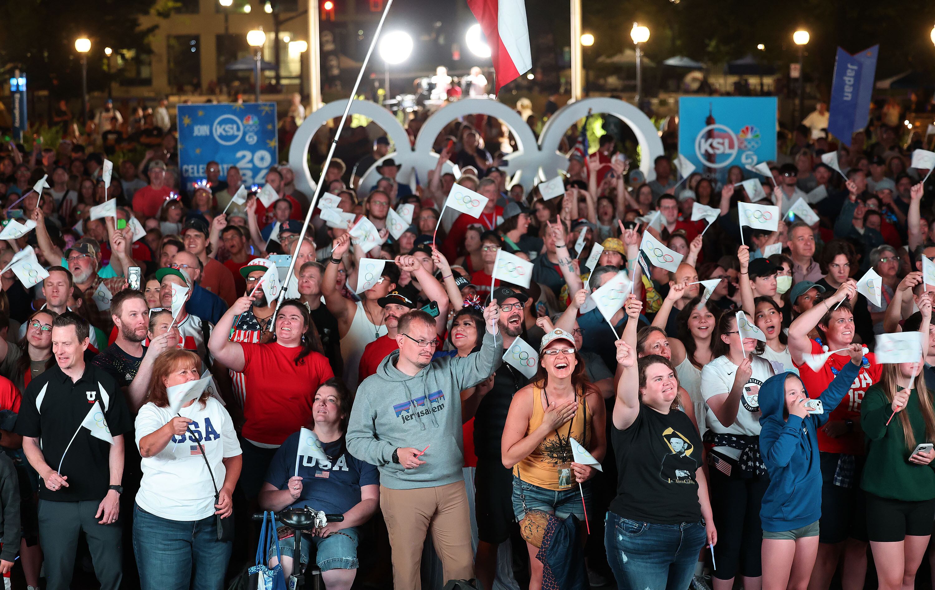 Attendees at the watch party for Salt Lake City’s 2034 Winter Olympics bid held at Washington Square Park in Salt Lake City on July 24, 2024. Two Republican senators spoke about the change to the hosting contract for Salt Lake City Tuesday.