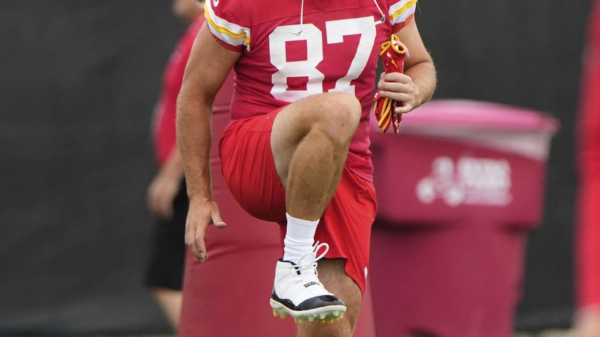 Kansas City Chiefs tight end Travis Kelce stretches during the NFL football team's practice Tuesday, June 17, 2025, in Kansas City, Mo.