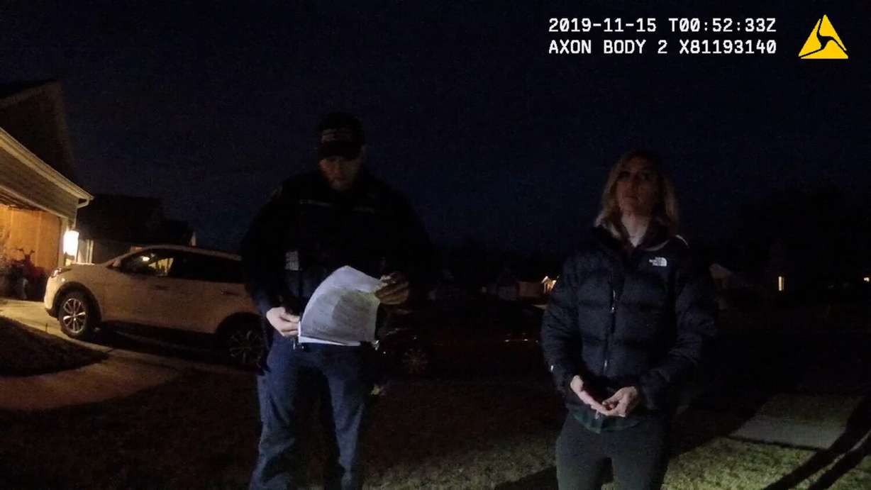 Melani Pawlowski speaking to American Fork police officers while on the Boudreaux’s property on Nov. 15, 2019.