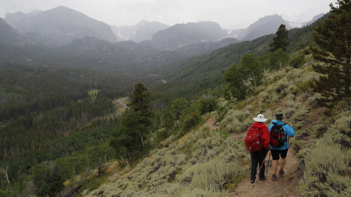 Hikers descend a ridge inside Rocky Mountain National Park, near Estes Park, Colo. on Aug. 4, 2016. Kuru recently ranked the national park as the third-best spot to hike.