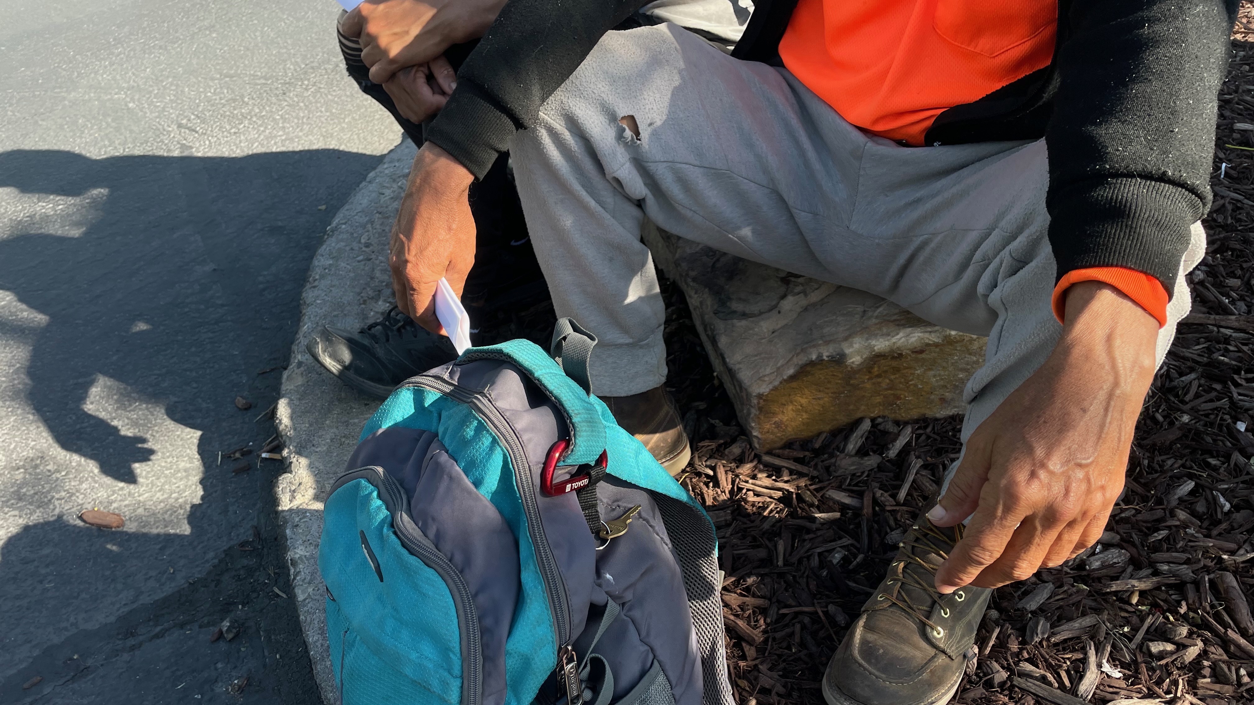Two day laborers outside a big box store in Salt Lake County on Wednesday. They say they keep at it despite the threat of immigration enforcement action out of necessity.