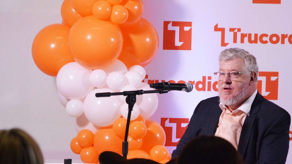 Trucordia CEO Felix Morgan announces the new investment in Trucordia at Wednesday's gathering.