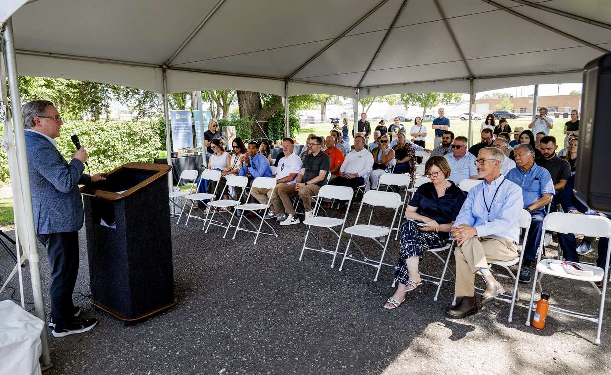 Terry Gentry, executive vice president of The Richmond Group, makes a few remarks as Housing Connect and First Step House hold a ceremonial groundbreaking of 44 North, an affordable housing development in Salt Lake City, on Wednesday.