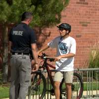 School resource officer gives new bike to West Jordan student in need