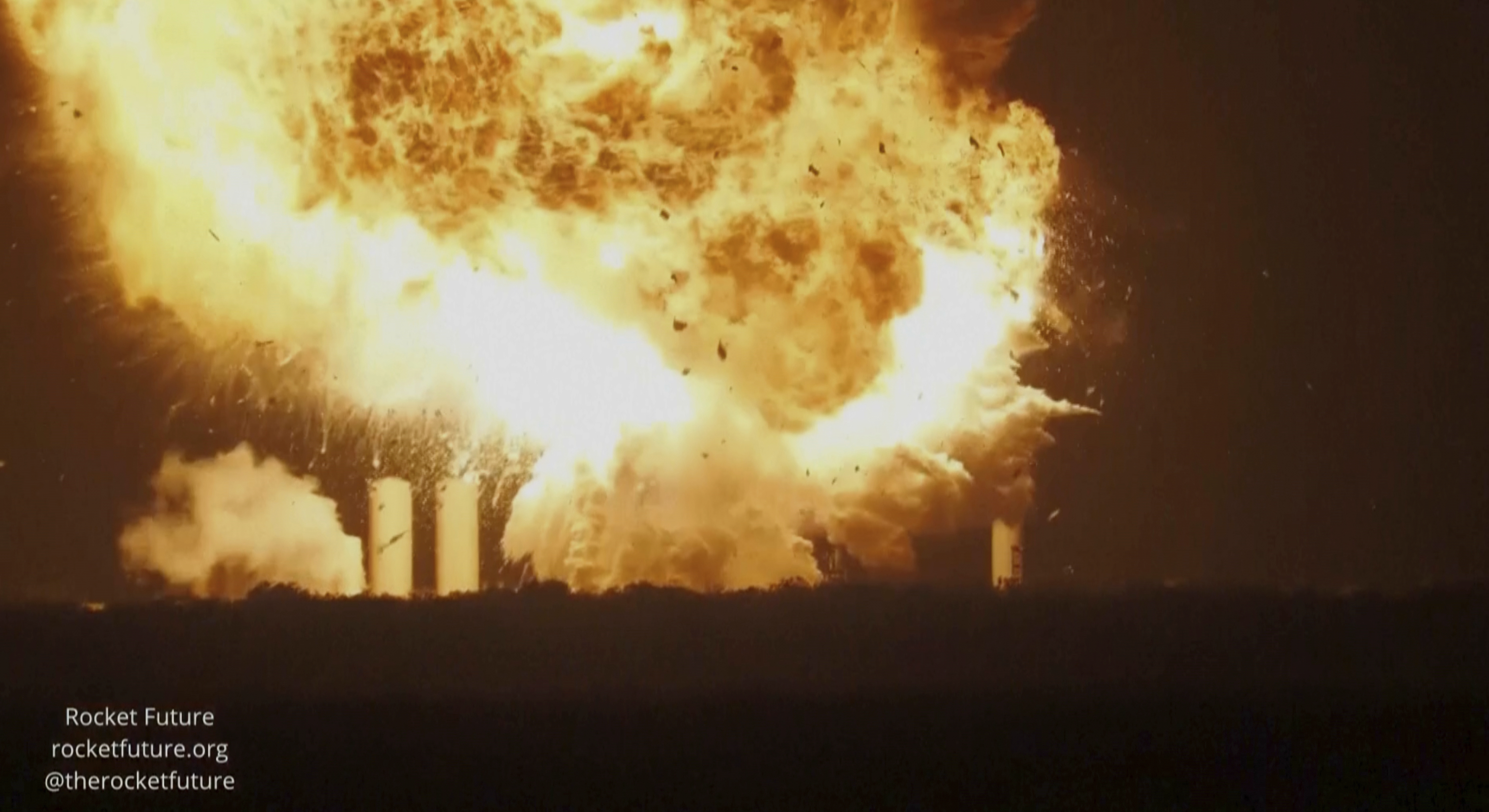A SpaceX rocket explodes at Starbase, SpaceX’s launch site at the southern tip of Texas late Wednesday.