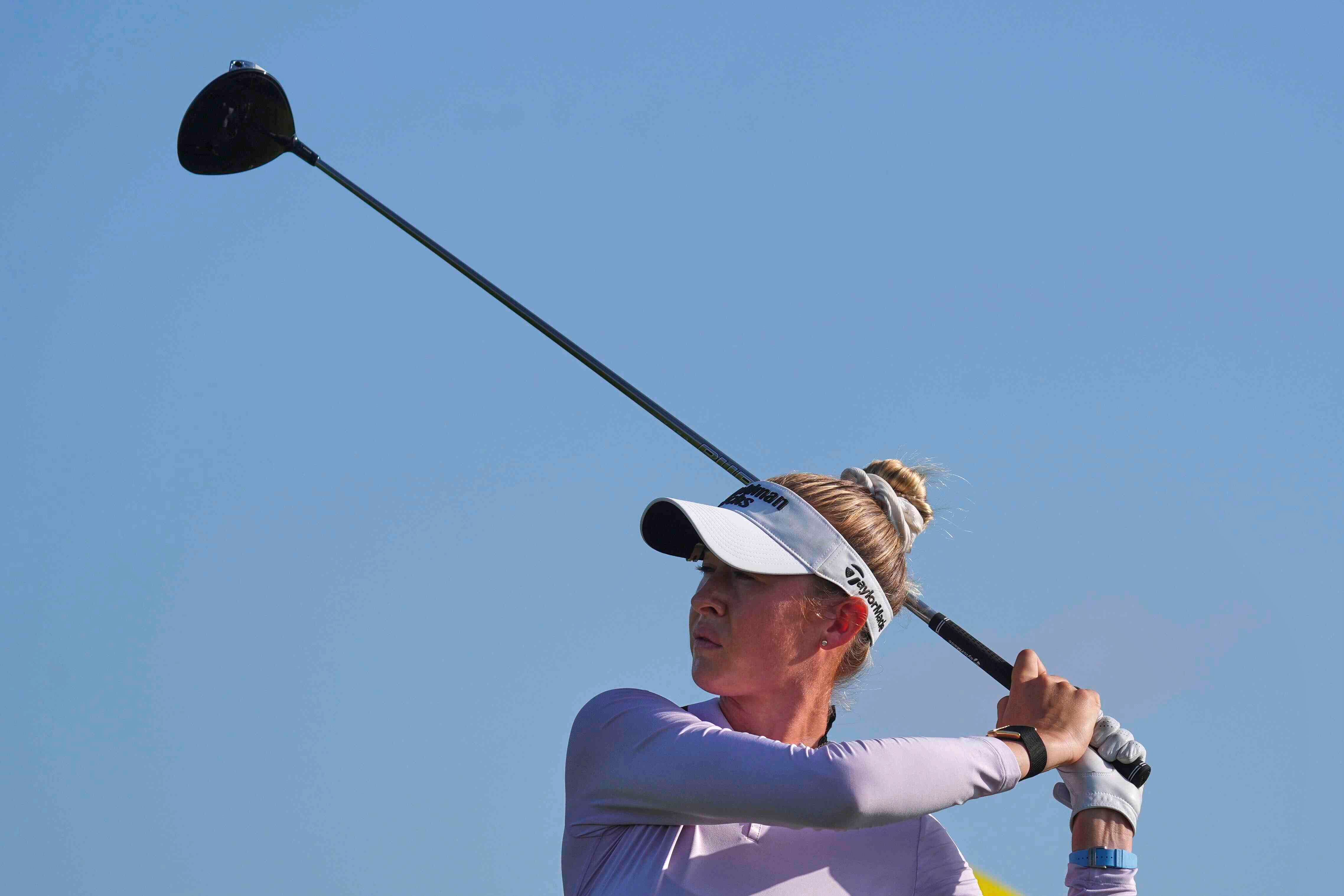 Nelly Korda hits a tee shot on the second hole during the first round of the Women's PGA Championship golf tournament, Thursday, June 19, 2025, in Frisco, Texas.