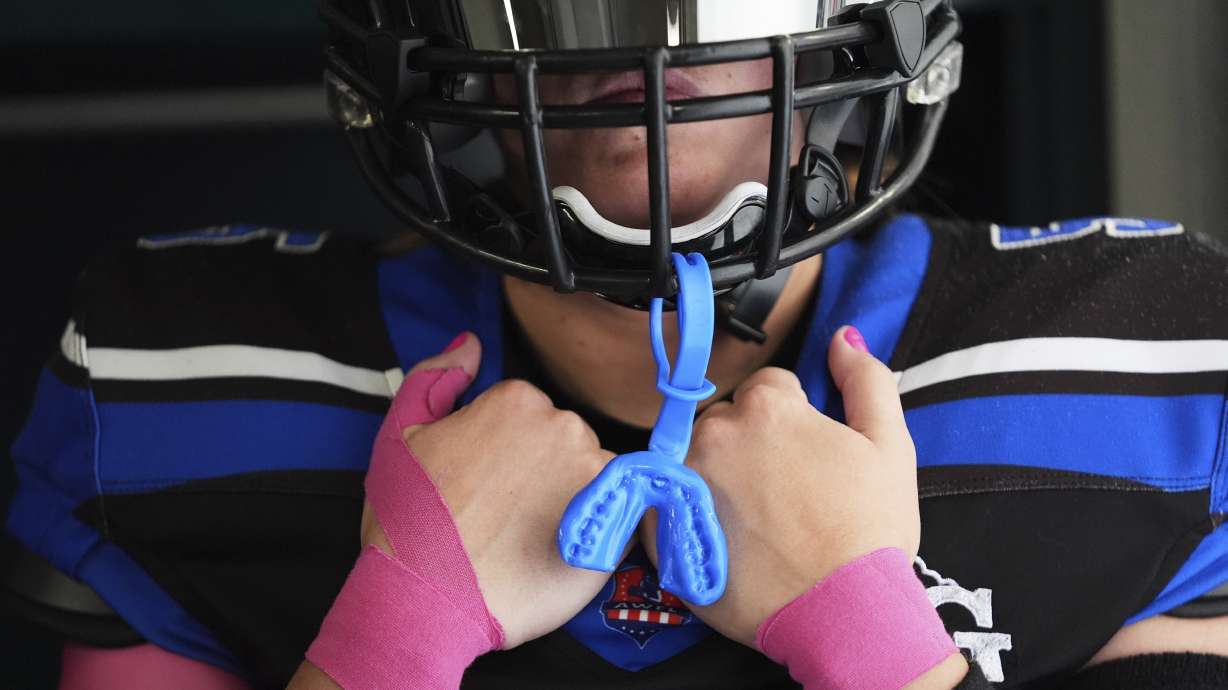 Detroit Prowl's Sydney Hebel waits in the locker room to take the field before an AWFL women's football game against the Lansing Legacy in Allen Park, Mich., Saturday, May 10, 2025.