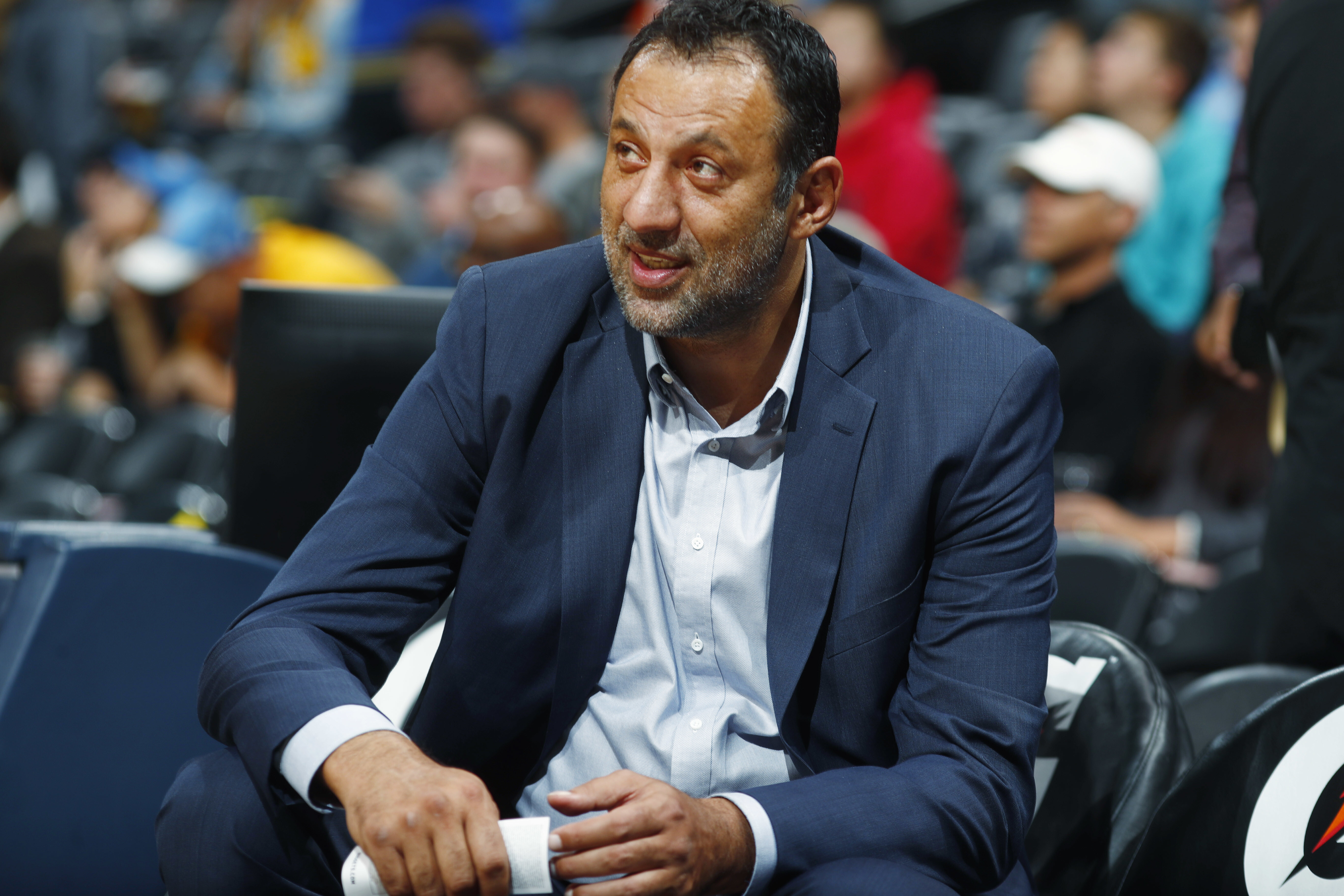 FILE -Sacramento Kings general manager Vlade Divac looks on from the bench as his team warms up before facing the Denver Nuggets in an NBA basketball game , Oct. 21, 2017, in Denver.