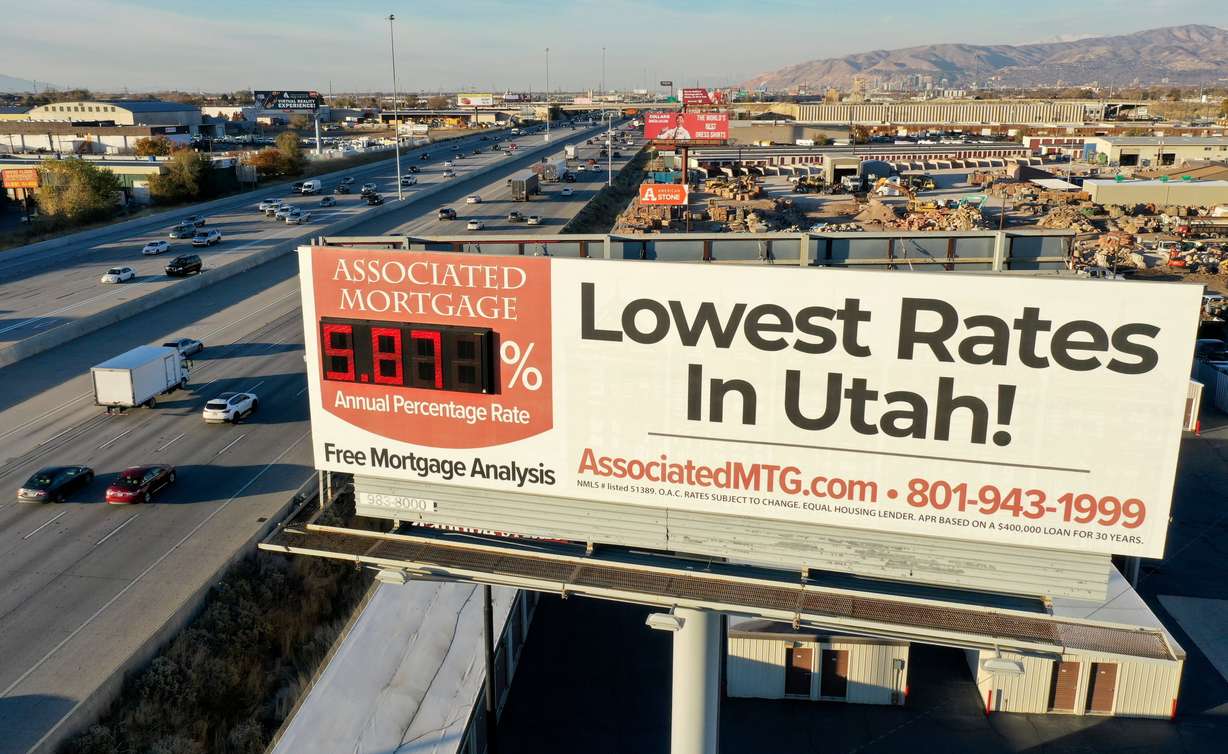 A billboard on the side of northbound I-15 in Murray advertises mortgage rates on Wednesday, Nov. 16, 2022.