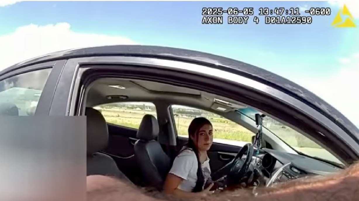 The image from body camera video shows University of Utah student Caroline Dias Goncalves during a June 5 traffic stop near Grand Junction, Colorado. The woman, living in Utah but originally from Brazil, was later detained by immigration officials.