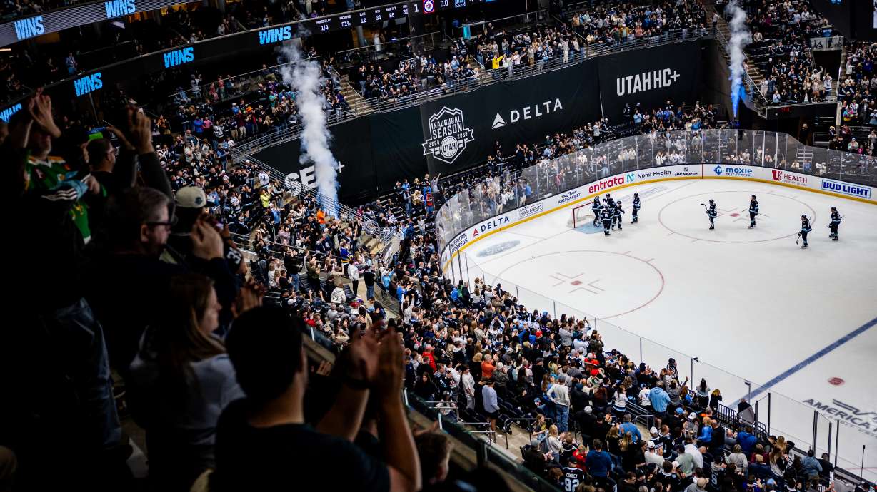 Utah Hockey Club fans cheer after the Utah Hockey Club wins 4-1 over the Winnipeg Jets during an NHL game at the Delta Center in Salt Lake City on Saturday, April 5, 2025.