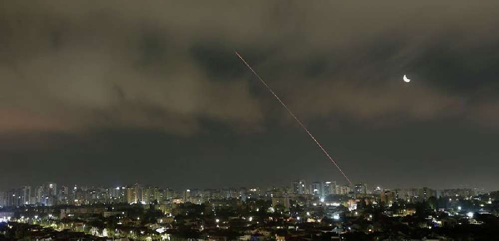 A missile launched from Iran is intercepted as seen from Ashkelon, Israel, Friday.
