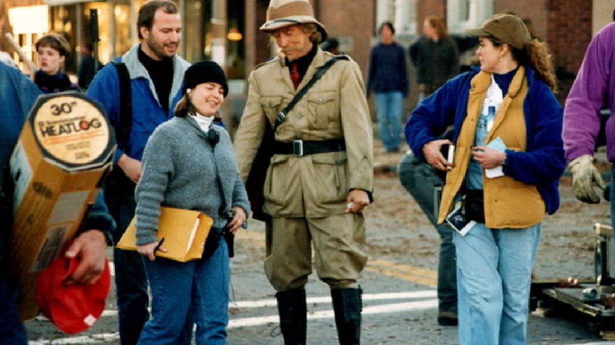 Actor Jonathan Hyde enjoys a moment with crew during filming of Jumanji on Nov. 17, 1994 in Keene, N.H.