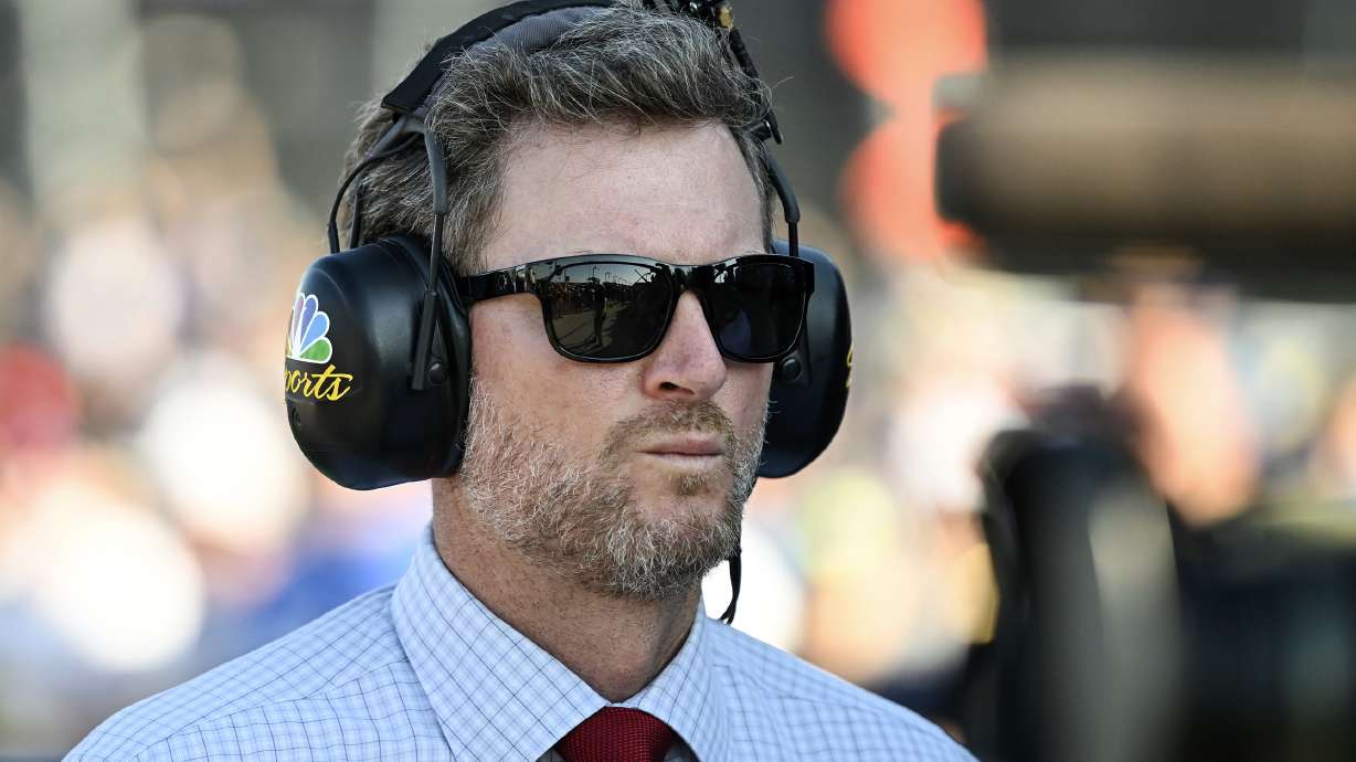 FILE - Hall of Fame driver Dale Earnhardt Jr. looks on prior to a NASCAR Cup Series auto race at Darlington Raceway, Sept. 3, 2023, in Darlington, S.C.