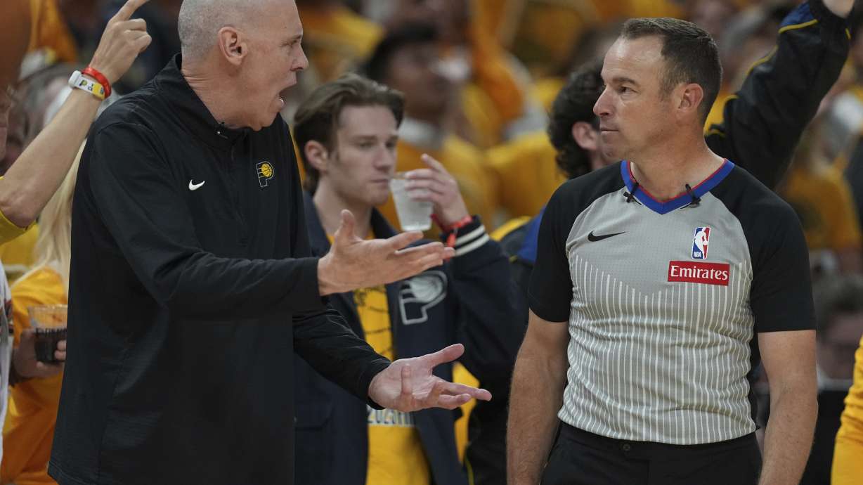 Indiana Pacers head coach Rick Carlisle argues with referee Josh Tiven during the second half of Game 4 of the NBA Finals basketball series against the Oklahoma City Thunder, Friday, June 13, 2025, in Indianapolis.