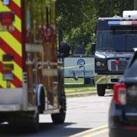Police say man opened fire outside a church before staff fatally shot him, averting mass shooting