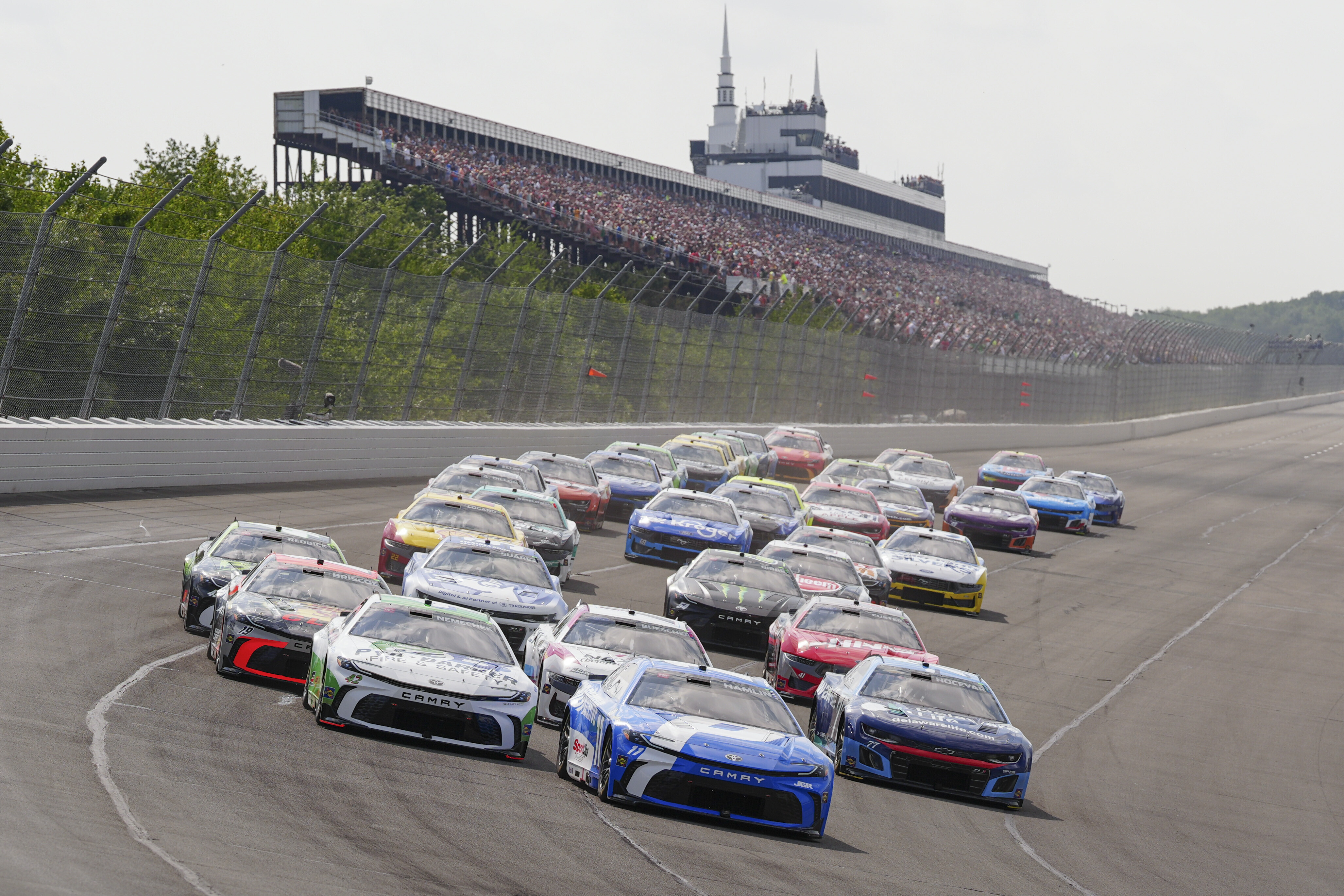 Chase Briscoe holds off Joe Gibbs Racing teammate Denny Hamlin to win at Pocono