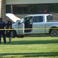 Man's mother is member of church where he opened fire before he was fatally shot, police say