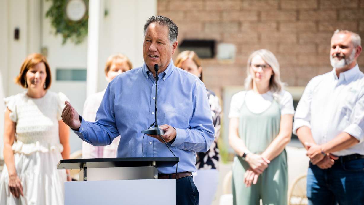 Tage Flint, CEO of Utah Water Ways, speaks during a press conference to showcase the future of new waterwise yards at a residence in Taylorsville on Monday.