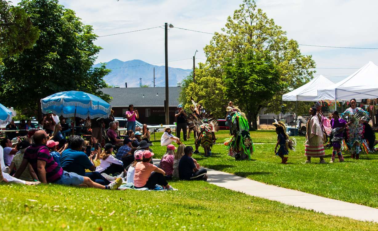 An audience watches an Indigenous performance as part of a Great Elephant Migration event at Warm Springs Park in Salt Lake City on Monday.