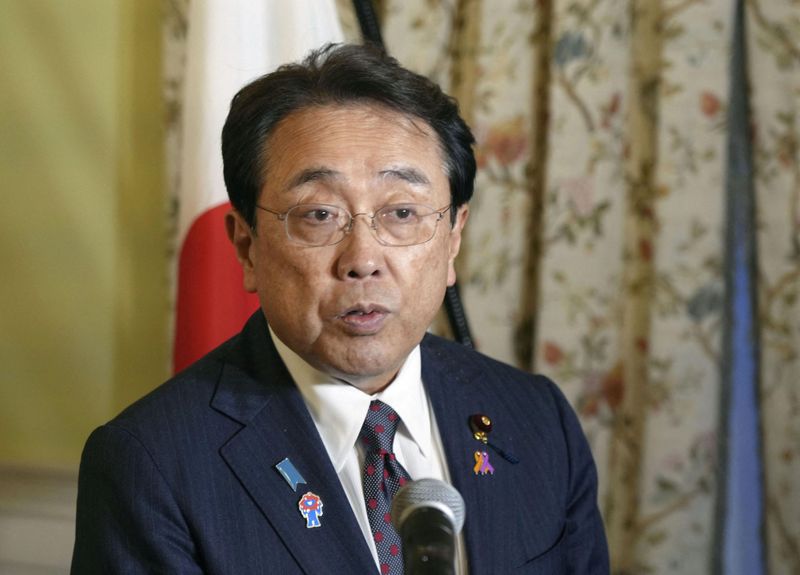 Japanese Economic Revitalization Minister Ryosei Akazawa speaks to the media at the White House in Washington, April 16. Akazawa wrote "#Mission Complete" on X following Wednesday's announcement of a trade deal between the U.S. and Japan.