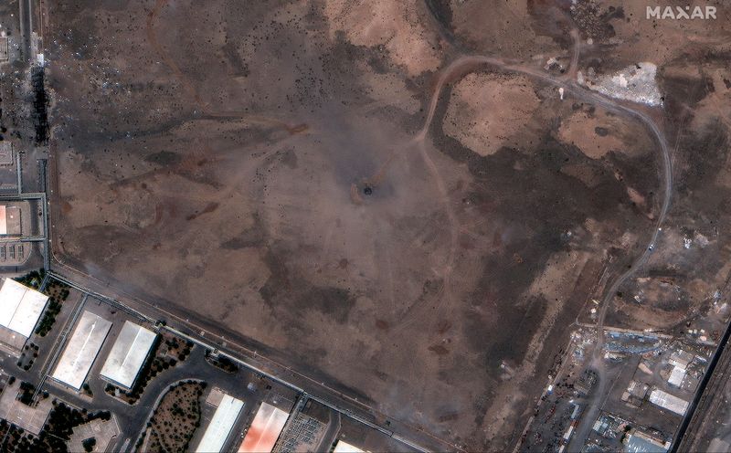 A close up of a crater over the underground Natanz Enrichment Facility, after U.S. airstrikes, near Natanz, Iran, Sunday. Initial assessments showed the strikes failed to destroy Iran's nuclear sites Tuesday as a shaky Iran-Israel ceasefire began.