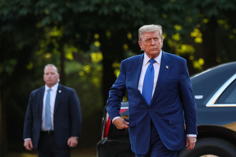 NATO commits to spending hike sought by Trump and to mutual defense