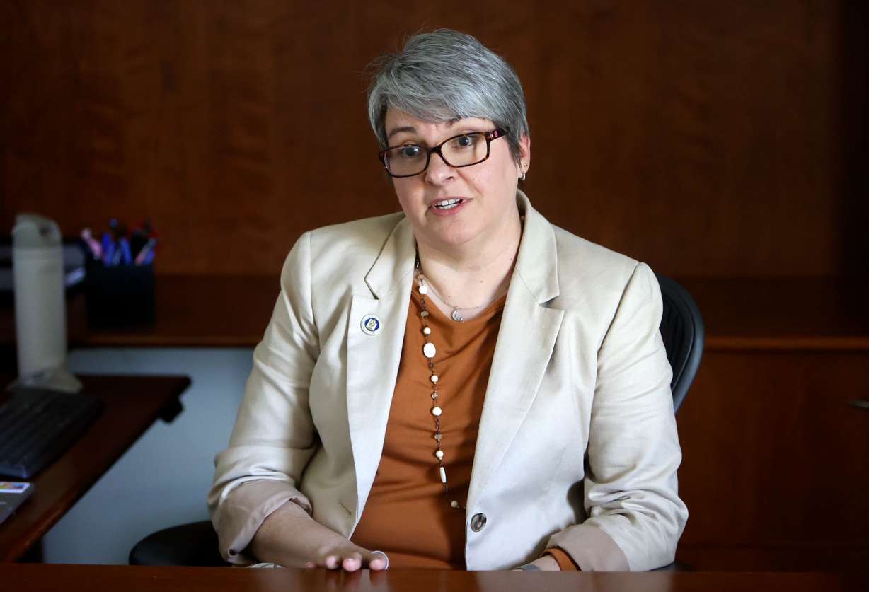 Molly Hart, state superintendent of public instruction, answers interview questions in her new office at the Utah State Board of Education in Salt Lake City on Monday.