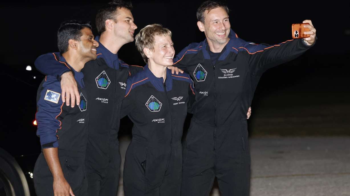 SpaceX Falcon 9 crew poses for a selfie before departing for a launch to the International Space Station at the Kennedy Space Center in Cape Canaveral, Fla., on Tuesday.
