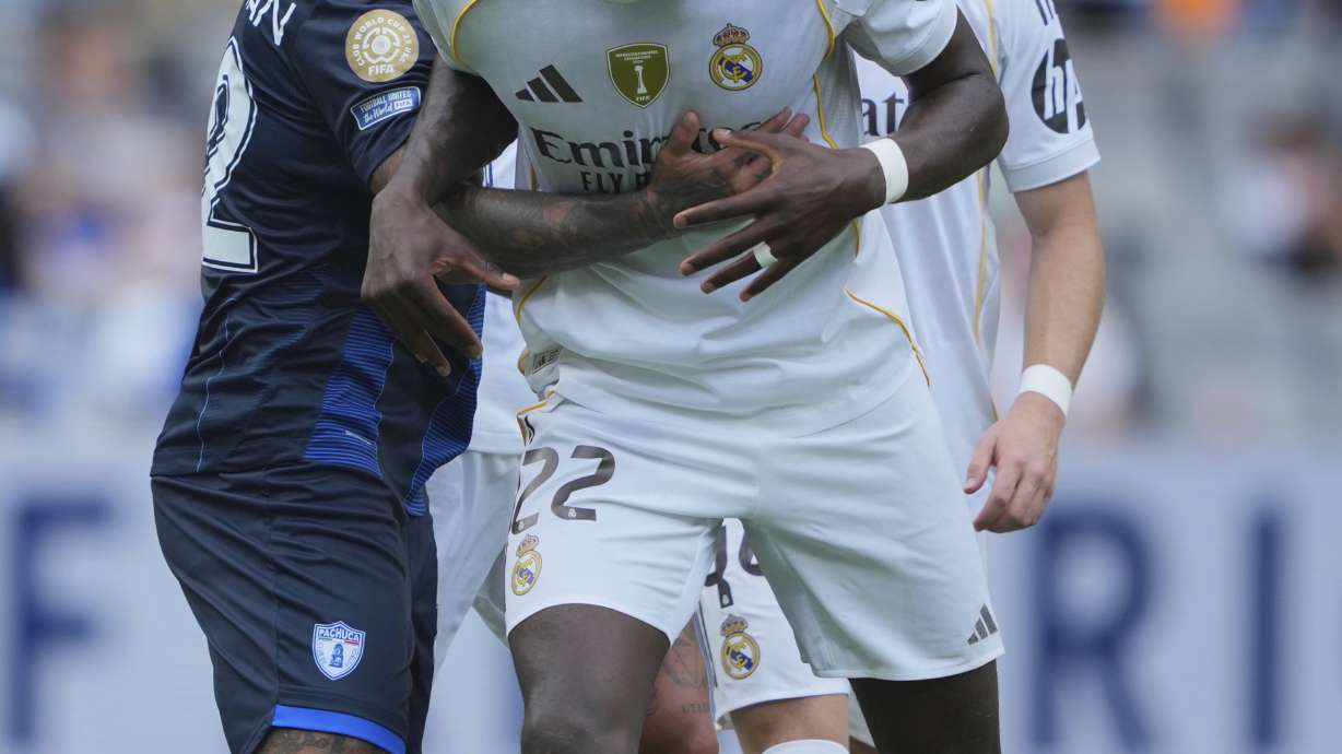 Real Madrid's Antonio Rudiger, front, gestures during the Club World Cup Group H soccer match between Real Madrid and CF Pachuca in Charlotte, N.C., Sunday, June 22, 2025.
