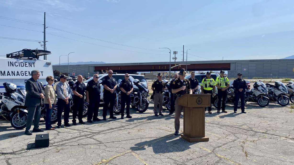Utah Highway Patrol Col. Michael Rapich is joined by officers from several jurisdictions and state lawmakers to announce that UHP will become the lead law enforcement agency overseeing the Bangerter Highway starting July 1.
