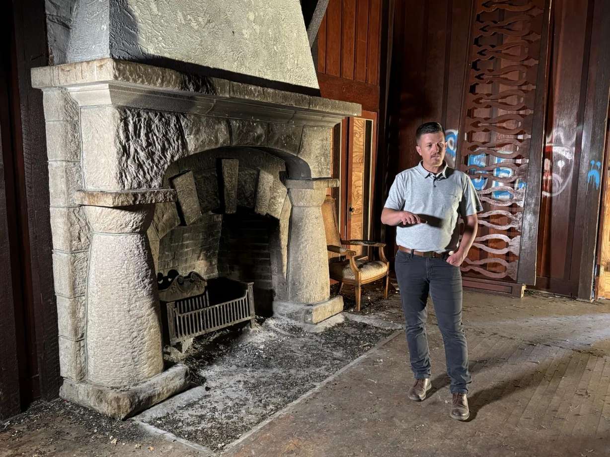 Rea estate agent Eric Jones gives a tour of the St. Ann's Retreat on Monday. "This property has a lot of great bones,” he said.