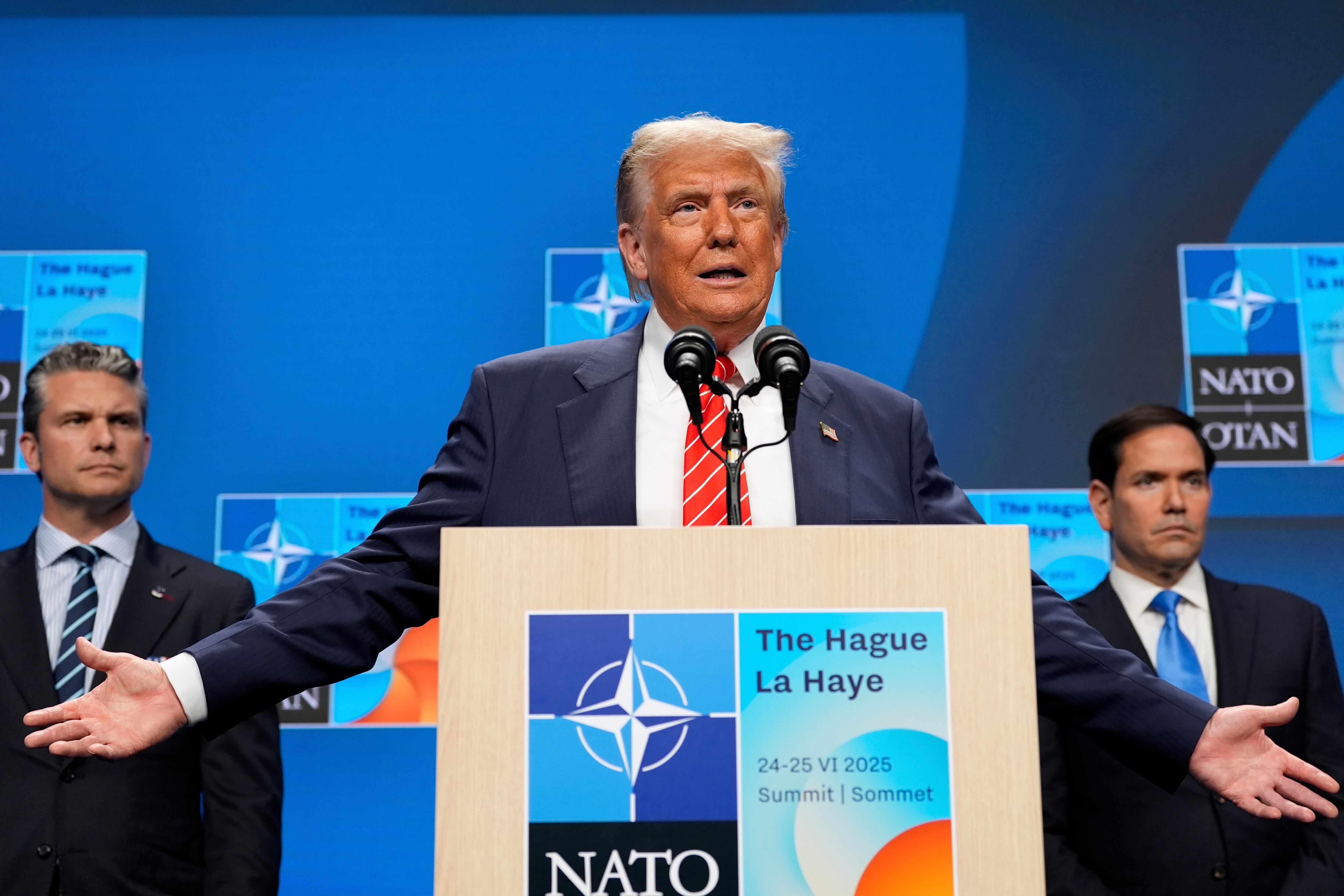 President Donald Trump speaks at the end of the NATO summit as Secretary of State Marco Rubio and Defense Secretary Pete Hegseth listen, in The Hague, Netherlands, Wednesday. The summit included discussions about whether nations should spend more than 5% on defense.