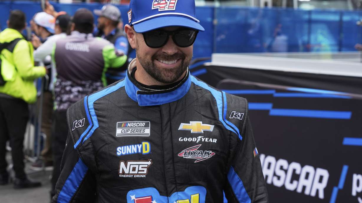 Ricky Stenhouse Jr. walks to his car before a NASCAR Cup Series auto race at Hermanos Rodríguez race track in Mexico City, Sunday, June 15, 2025.