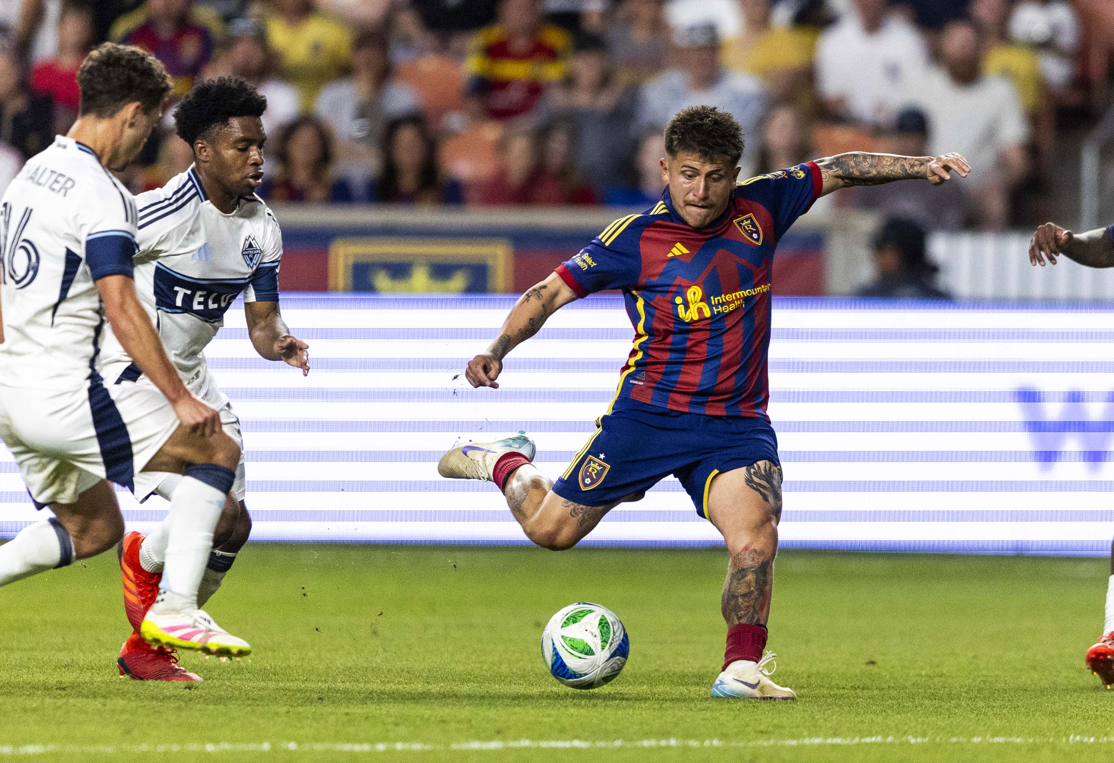 Real Salt Lake midfielder Diego Luna (8) takes a shot on goal during a MLS match between Real Salt Lake and the Vancouver Whitecaps at America First Field in Sandy on Saturday, May 24, 2025.