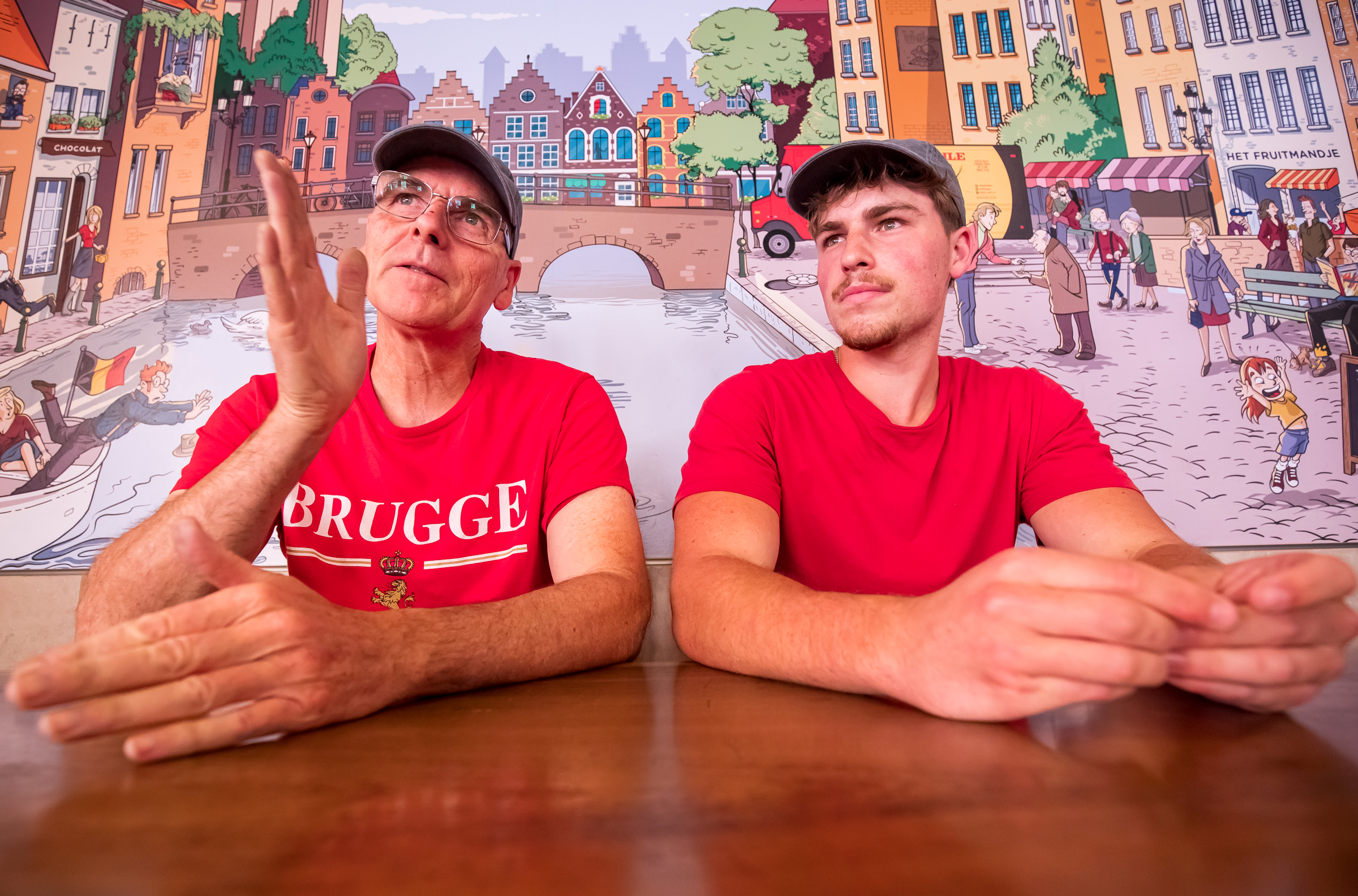 Pierre Vandamme, the owner and founder of Bruges Belgian Bistro, left, and Noe Vandamme, the company's retail operations manager, discuss Sugar House construction hardships within their Sugar House location on Wednesday.