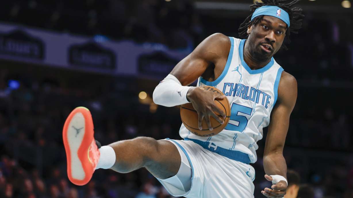 FILE - Charlotte Hornets center Mark Williams pulls down a rebound against the Utah Jazz during the first half of an NBA basketball game in Charlotte, N.C., Monday, March 31, 2025.
