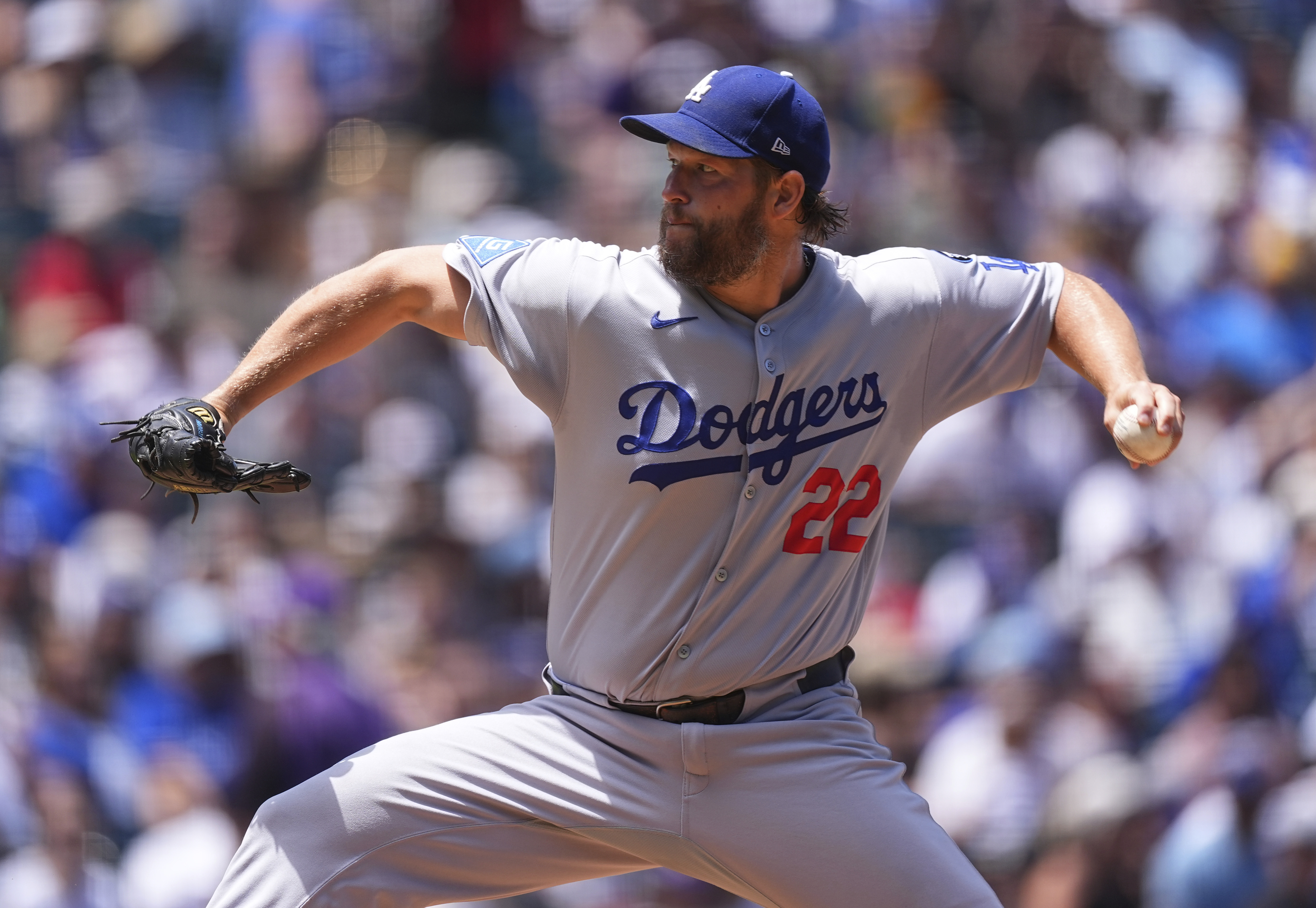 Los Angeles Dodgers starting pitcher Clayton Kershaw works against the Colorado Rockies in the first inning of a baseball game Thursday, June 26, 2025, in Denver. 