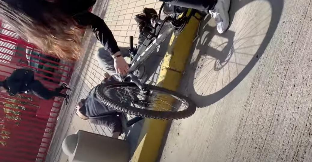 A reporter and cyclist collide in this video in Santiago, Chile, May 31.