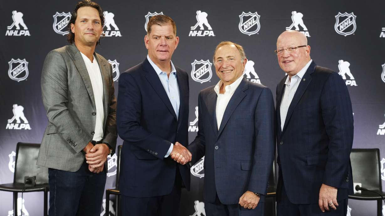 From left to right, Ron Hainsey, NHLPA Assistant Executive Director, Marty Walsh, NHLPA Executive Director, Gary Bettman, NHL Commissioner, and Bill Daly, NHL Deputy Commissioner, pose for photos after a joint press conference before the NHL hockey draft Friday, June 27, 2025, in Los Angeles.
