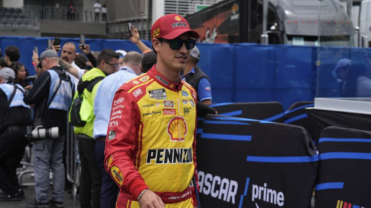 Joey Logano walks to his car before a NASCAR Cup Series auto race at Hermanos RodrÃguez race track in Mexico City, Sunday, June 15, 2025.