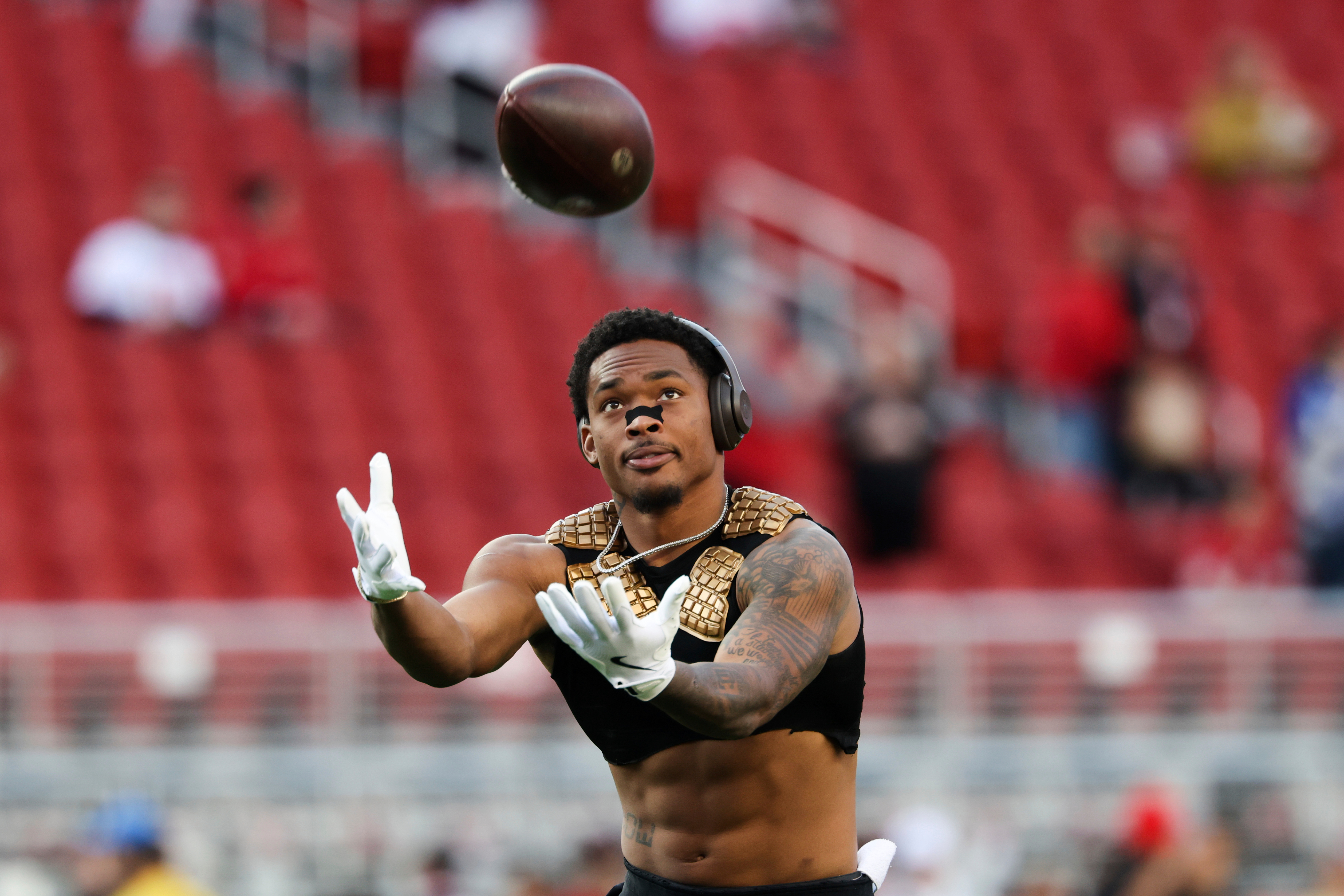 FILE - San Francisco 49ers cornerback Deommodore Lenoir (2) warms up before an NFL football game against the Detroit Lions, Dec. 30, 2024, in Santa Clara, Calif. 