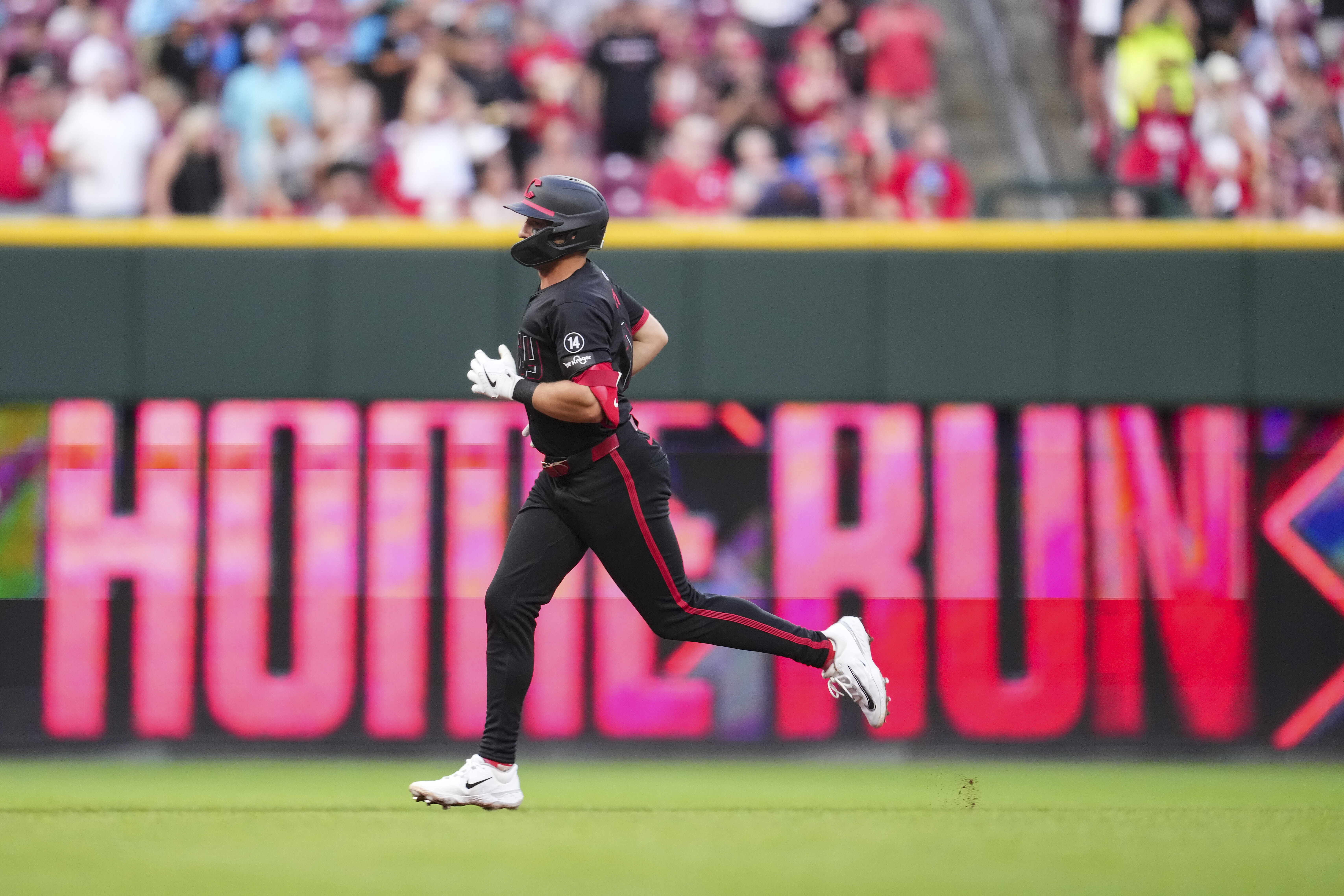 Cincinnati Reds' Spencer Steer rounds the bases after hitting a two-run home run during the fifth inning of a baseball game against the San Diego Padres, Friday, June 27, 2025, in Cincinnati. 