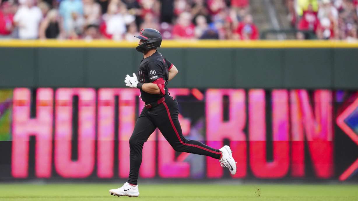 Cincinnati Reds' Spencer Steer rounds the bases after hitting a two-run home run during the fifth inning of a baseball game against the San Diego Padres, Friday, June 27, 2025, in Cincinnati.