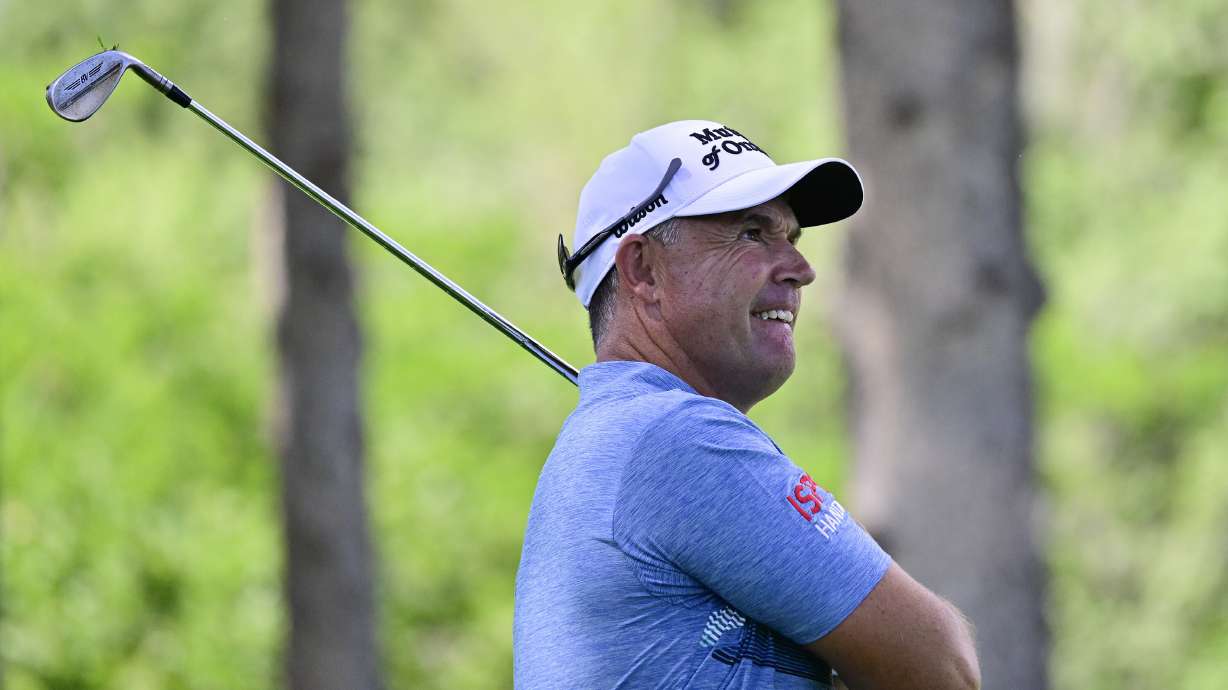 PĀ·draig Harrington follows the flight of his shot off the 16th hole tee box during the second round of the U.S. Senior Open Championship golf tournament at Broadmoor Golf Club, Friday, June 27, 2025, in Colorado Springs, Colo.