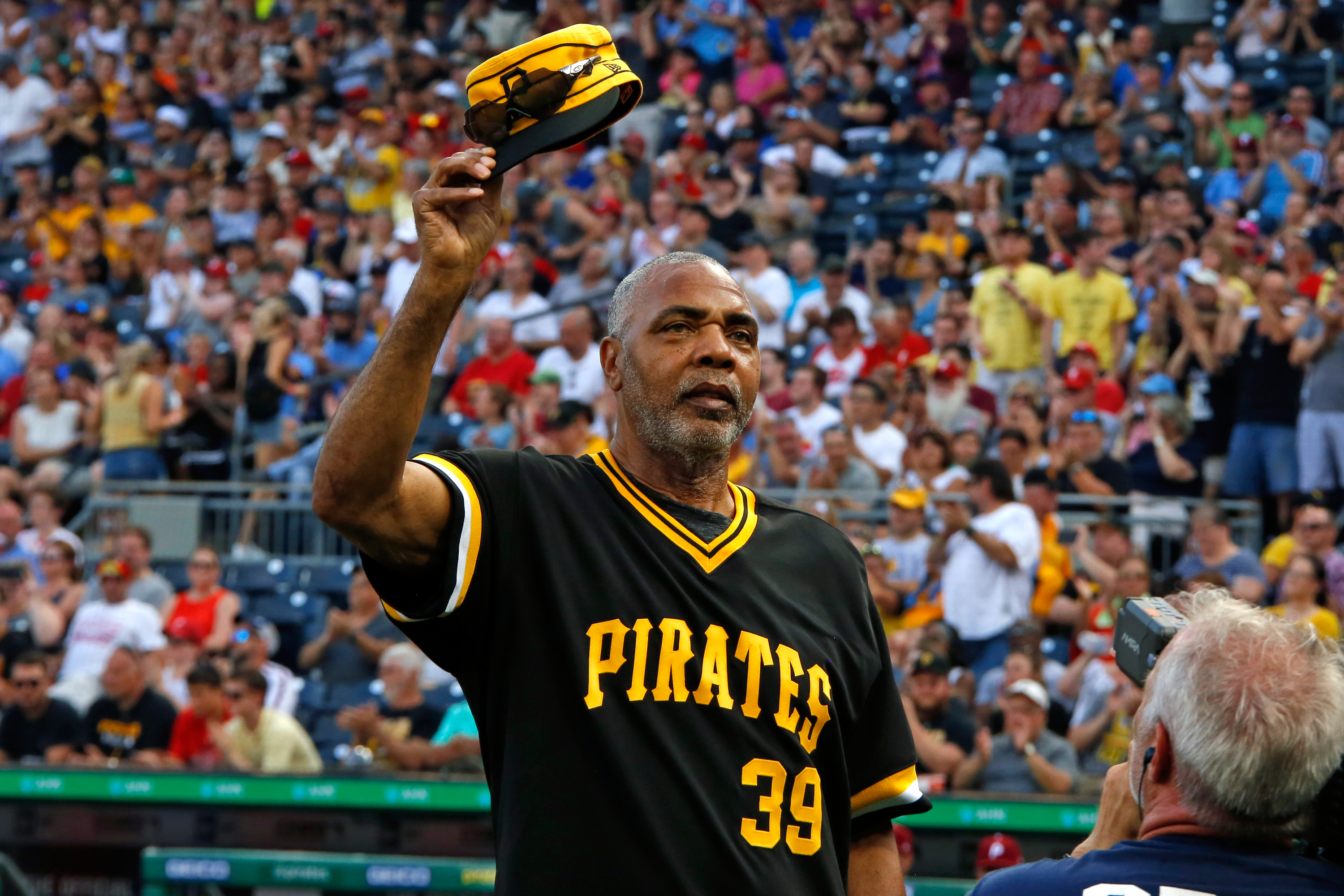 FILE - Dave Parker, a member of the 1979 Pittsburgh Pirates World Championship team, tips his cap during a pre-game ceremony honoring the team before a baseball game between the Pittsburgh Pirates and the Philadelphia Phillies in Pittsburgh, Saturday, July 20, 2019. 